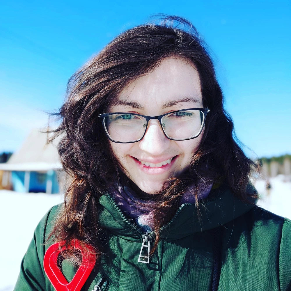 Smiling Patios Dallas customer enjoying outdoor space during winter weather